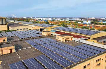 Industrial rooftop solar application · Reference photo